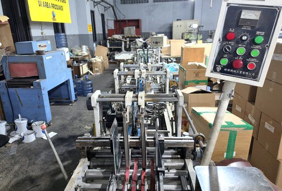 Mesin folding & gluing carton